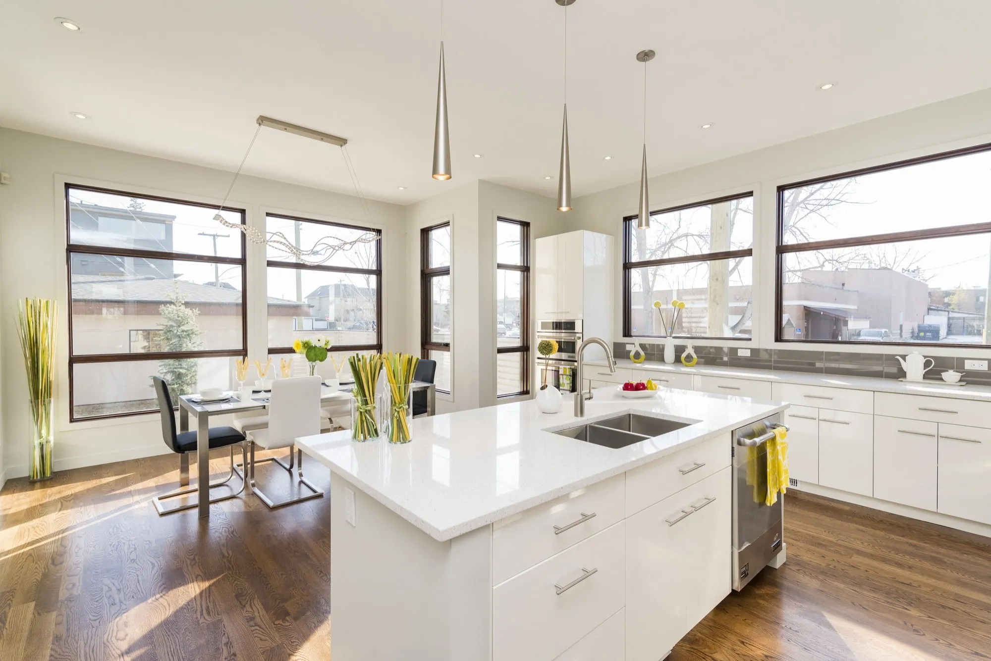 Bright, spotless open-plan kitchen and dining area in a Metro Detroit home cleaned by DITA Pro Clean